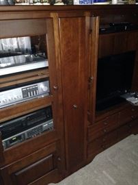 Entertainment center (custom made in Berea, Kentucky) with lots of storage 