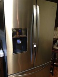 Like-new Whirlpool stainless steel refrigerator