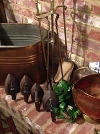 Old irons, fireplace tools, and copper selections