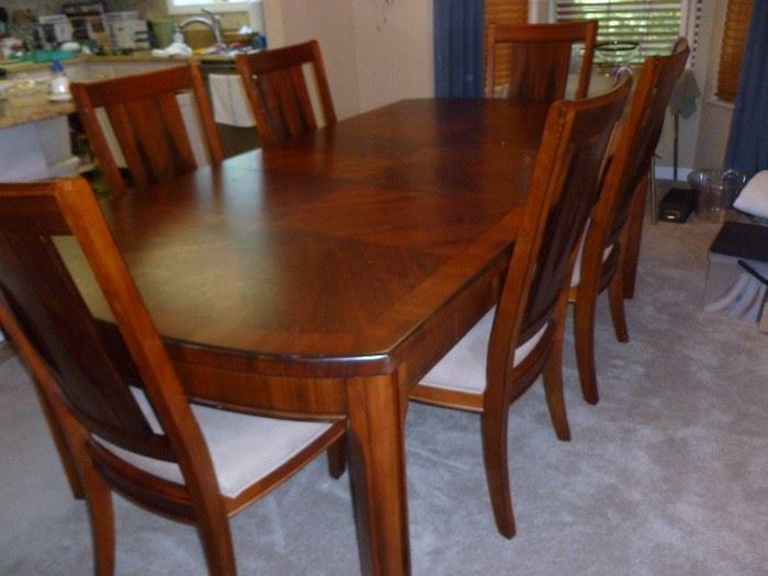 Beautiful table and 8 chairs (only 6 shown) from Carol House