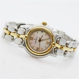 Bertolucci "Pulchra" Stainless and 18K Yellow Gold Ladies Wristwatch: A Bertolucci stainless and 18K yellow gold wristwatch. Features three hands, roman numerals and date window, with a matching bracelet.