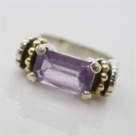 Lagos Caviar Sterling Silver 18K Yellow Gold Amethyst Ring: A Lagos Caviar sterling silver and 18K yellow gold accent amethyst ring. A center prong set rectangular amethyst is mounted between two arched gold bead accents and arched sterling shoulder design.