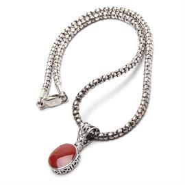 Sterling Silver Imitation Red Jasper Popcorn-Style Chain Necklace: A sterling silver popcorn-style chain necklace featuring a pendant showcasing an imitation red jasper stone. The chain is marked “925” to the lobster claw clasp, and the pendant is additionally marked as sterling silver. Overall weight is 0.655 ozt, inclusive of all materials.