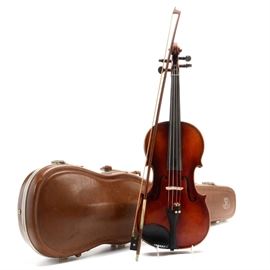 Vintage E.R. Pfretzschner Stradivarius Copy Violin with Case: A vintage E.R. Pfretzschner, hand-made violin with Roth Caspari pegs. This violin is a copy of a Stradivarius, made in West Germany, and comes with a strung bow and a brown Scherl & Roth, lined violin case. It is marked inside the f-hole with a paper label which reads, “E.R. Pfretzschner Mittenwald Obb. 1965”.