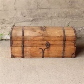 Antique Pine Dome Chest: An Antique handmade dome top chest. This unit features dove-tail seams; with hand-forged nails, handles, and metal banding; and a small section shelf to the interior for storage of smaller items. This item does not have a key, nor does it lock.
