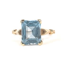 10K Yellow Gold Ring with Topaz: A 10K yellow gold ring with topaz.