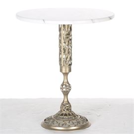Marble Top Brass Accent Table: A brass filigree accent table. This table features a round marble top and an openwork candlestick base with foliate motifs. The piece is not marked.