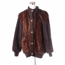 Vintage Women's Mink and Wool Sweater Jacket: A vintage women’s mink and wool sweater jacket. The button sweater, from Hanna & Demetrios Furriers, features brown mink front and back panels with wool blouson sleeves. The jacket includes rib knit trim on the collar, front placket, cuffs, and hem.
