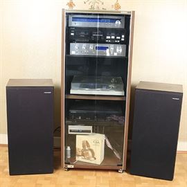 Pioneer Stereo and Speakers: A Pioneer stereo and speakers system. This system includes two stand up speakers, a Pioneer stereo tuner TX-810, a double deck Sony cassette player, a Pioneer stereo amplifier, a pioneer six deck CD player and a Pioneer turn table. Also included is a set of Koss K/6A dynamic headphones.