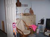 RATTAN CHAIR & BLONDE CHEST OF DRAWERS