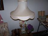 ONE OF THE FIGURAL LAMPS