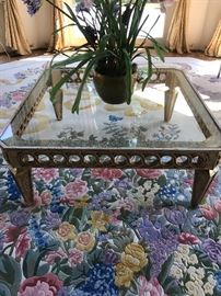 Carved wood coffee table