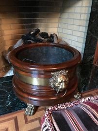 Large brass lion head adorned ash holder