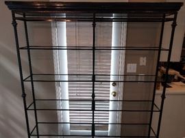 Very nice wrought iron/glass etagere; measures 6' 6" tall x 5' 4" wide x 10" deep.