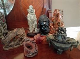 Again, more pics to come, but there is a nice collection of carved Asian stone figurines.