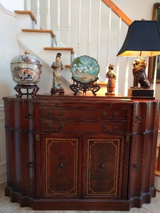 Gorgeous 1940's mahogany buffet, with leather inlay top and two door fronts, opens to a bar!