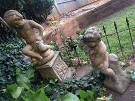 Aww, more precious concrete yard jewelry, also some vintage iron fencing.