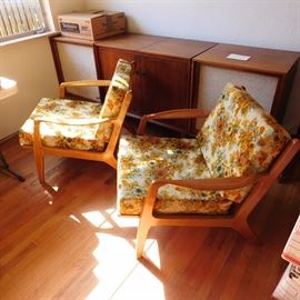 two teak mid-century modern lounge chairs