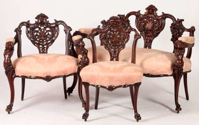 27 - Exquisite Three Piece Pierced Carved Mahogany Parlor Suite with Winged Cherub Supports att. to R J Horner