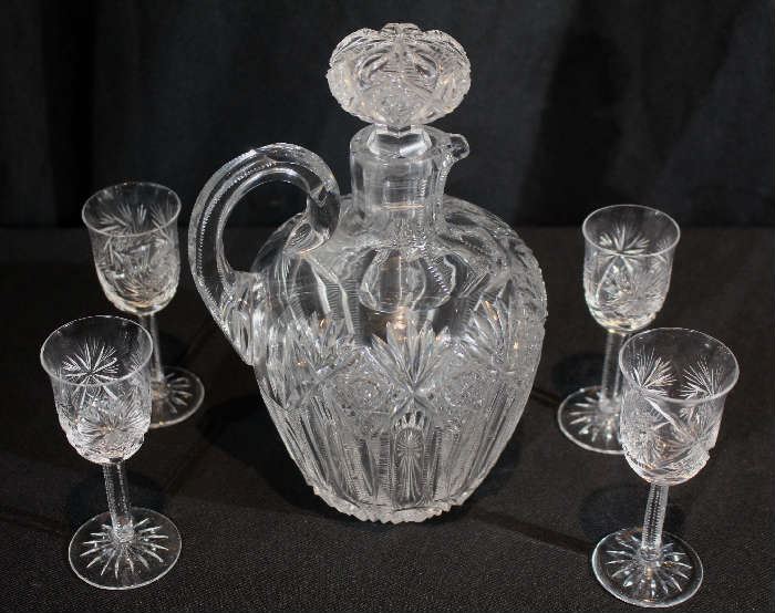 5 - Five piece brilliant cut glass cordial set signed Hawkes, 8 in. T, 4 in. H-S