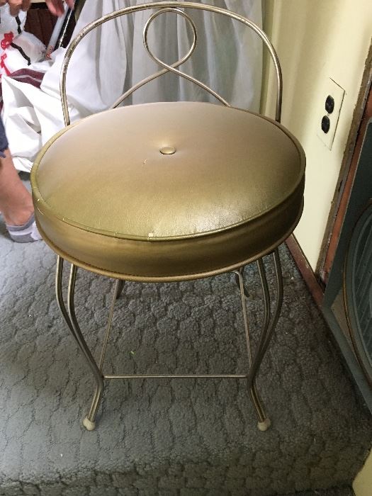 Adorable vanity stool.