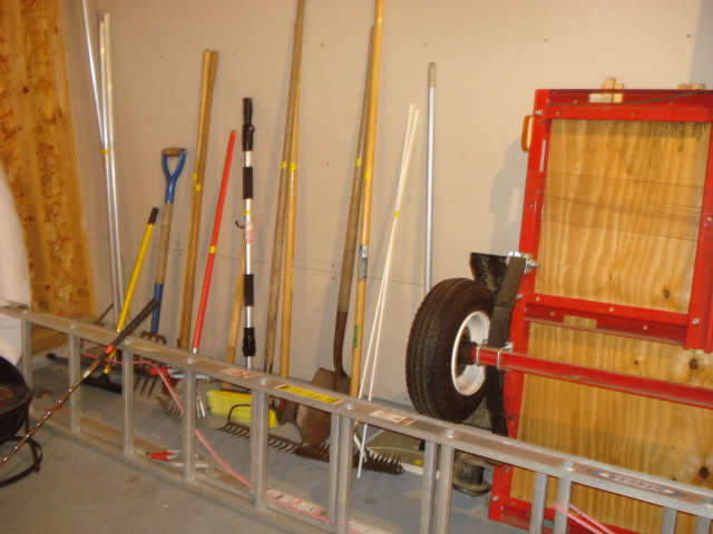 lawn and garden tools, trailer, ladder
