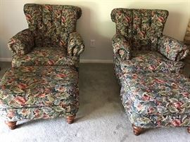 2 Floral stuffed armchairs with ottomans