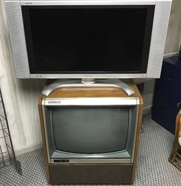 Modern flatscreen on top of a vintage Zenith Space Command television
