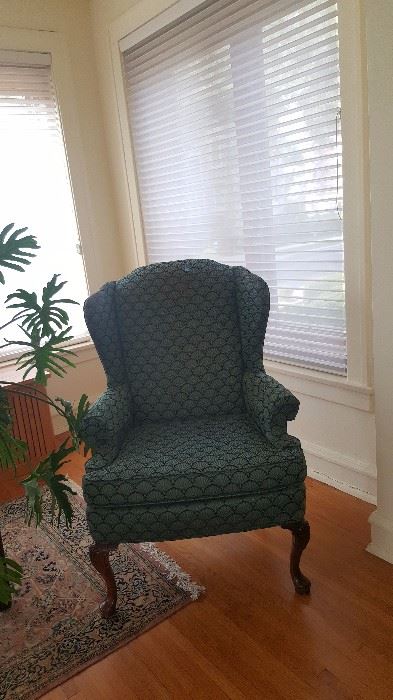 One of a pair of wing back chairs By Ethan Allen