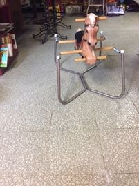Vintage Child's rocking horse which bounces and goes back and forth