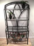 Large glass and metal winerack and baker's rack.