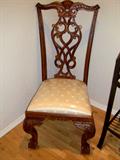 Gorgeous antique inspired carved wooden chair. Seat still has protective plastic over it.