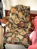 Large, tapestry upholstered occasional chair.