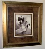 Floral print, matted, with burnished gold frame.