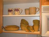 Dishes and coffee mugs.