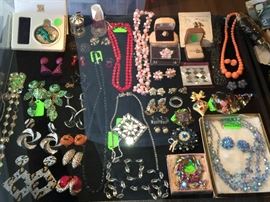 Costume Jewelry and Watches, Vintage and Retro to Sterling and Turquoise, Ethnic Beaded Jewelry to Richard Kerr Designer Earrings, Estee Lauder jeweled compacts to an Antique Bone Puzzle Ball.