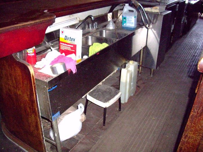 Service sink under bar sold separately.