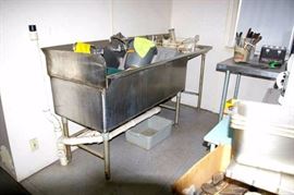 Large kitchen sink & supplies.