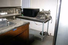 Kitchen appliances and cart.