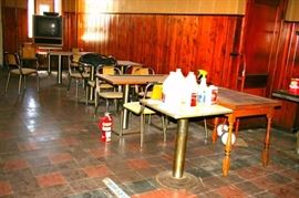 More padded chrome chairs and tables.