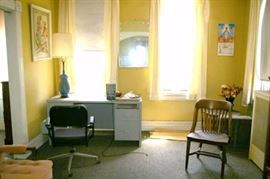 Desk, office chair, wood chair, lamp & shade, antique hanging mirror, picture (I think it's needlework).