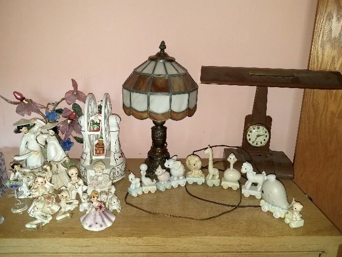 Precious moments and other collectible figurines. Stained glass lamp. vintage clock lamp