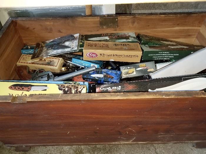 Trunk full of hunting knives and more