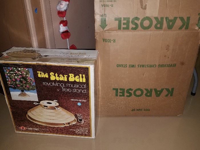 Vintage Christmas tree stands. The Star Bell and Karosel.