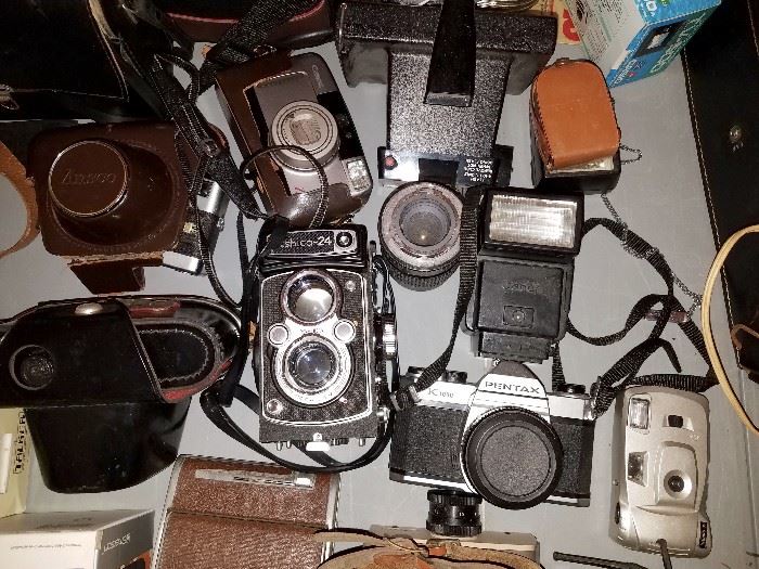 Vintage cameras and equipment. Including...Walz, Voigtander, Pentax, Yashika, Toshiba and more