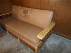 "Wagon Wheel" sofa needs upholstery repair
