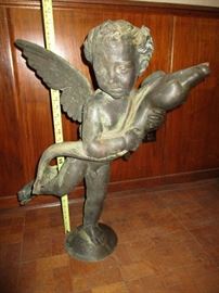 Antique bronze fountain topper titled, "Putto with Dolphin", by Andrea del Verrocchio.  27" tall