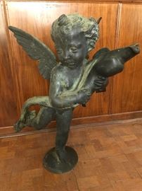 Antique bronze fountain topper titled, "Putto with Dolphin", by Andrea del Verrocchio.  27" tall