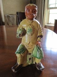 Antique tin glaze monkey figurine