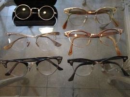 Several pairs of vintage gold filled cat eye glasses